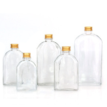 empty flat shaped clear color 100ml 200ml 250ml 350ml 500ml wine glass bottle with screw gold aluminum lid